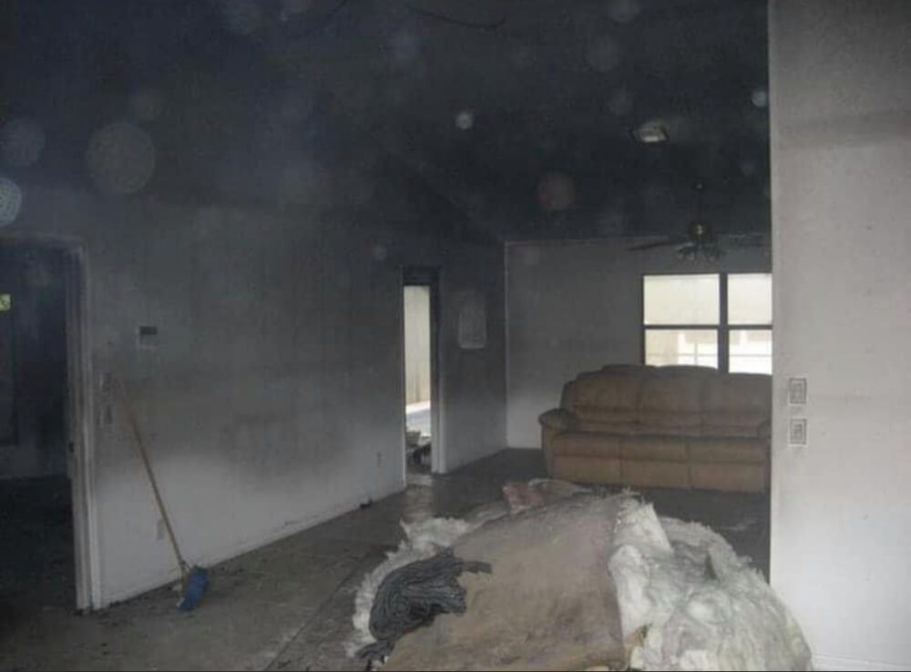 Fire Damage Restoration before living area