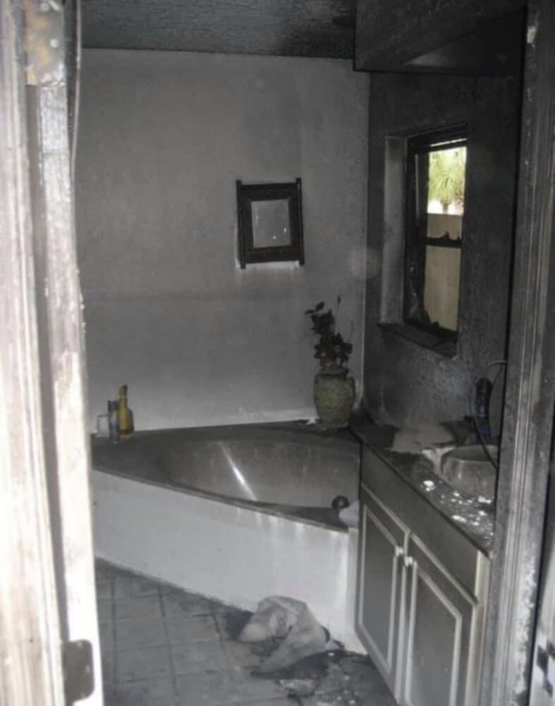 Fire Damage Restoration before bathroom